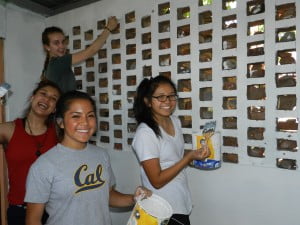 McKenna, Jessica, Christine, & Vy painting in the Psychology room