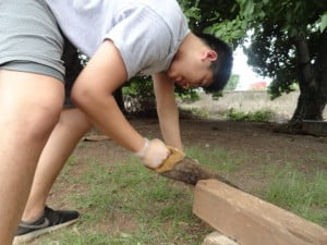 Nick sawing the wood!