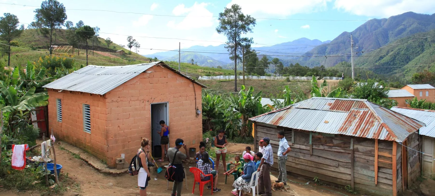 Rural landscape with students working in the foreground