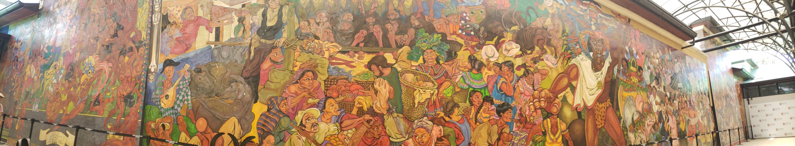 Mural depicting history of Costa Rica from left to right, indigenous to modern
